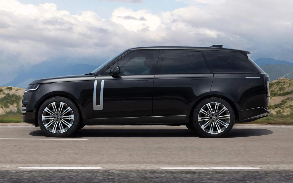Range Rover Vogue SV noir de profil, véhicule de la gamme First Luxe Velour